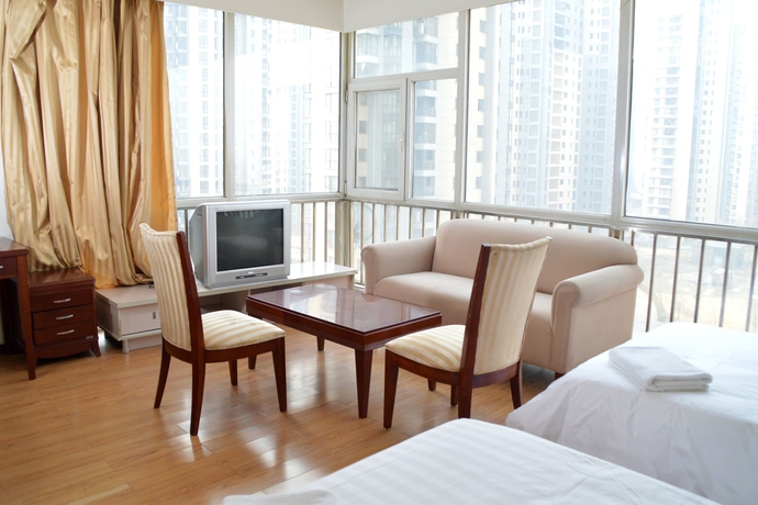 Imagen de los interiores del Hotel Tianjin Chaoju Apartment. Foto 19