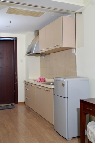 Imagen de la habitación del Hotel Tianjin Chaoju Apartment. Foto 17