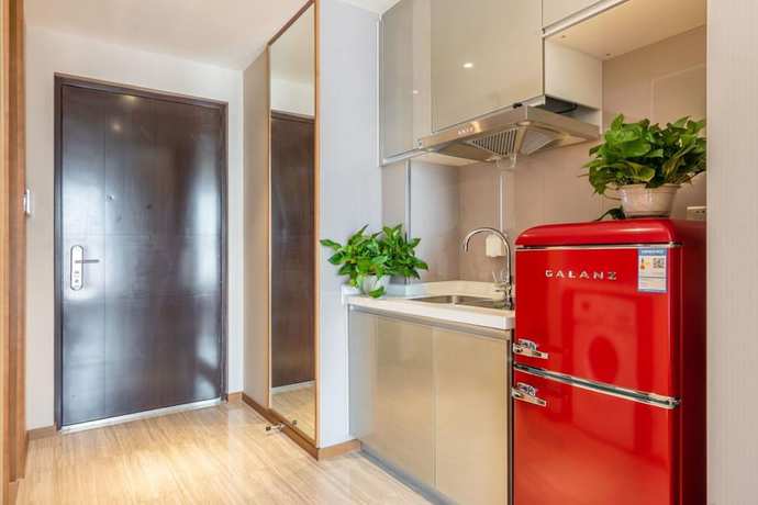 Imagen de la habitación del Hotel Tianjin G. Foto 19