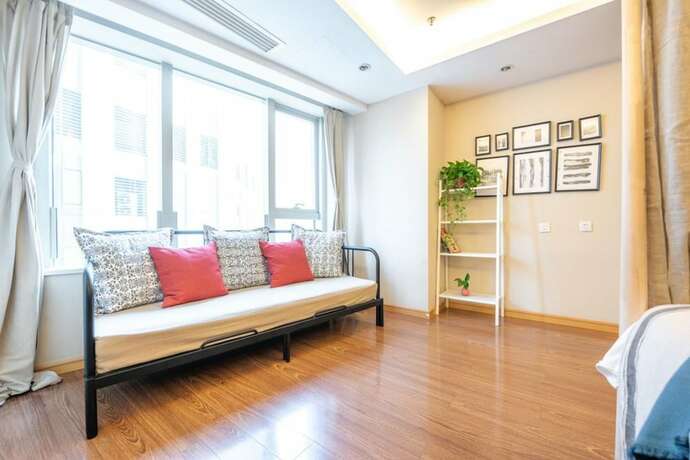Imagen de la habitación del Hotel Tianjin G'apartment. Foto 16