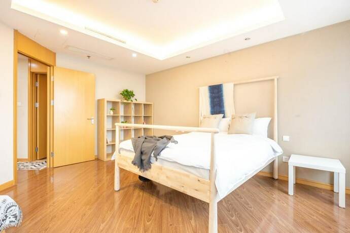 Imagen de la habitación del Hotel Tianjin G'apartment. Foto 21