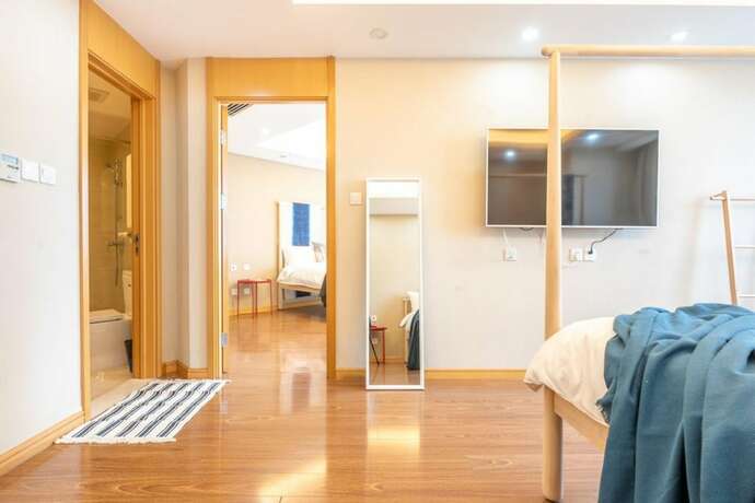 Imagen de la habitación del Hotel Tianjin G'apartment. Foto 36