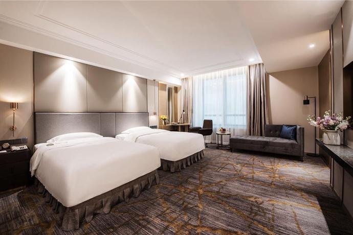 Imagen de la habitación del Hotel Tianjin Golden Crown. Foto 3