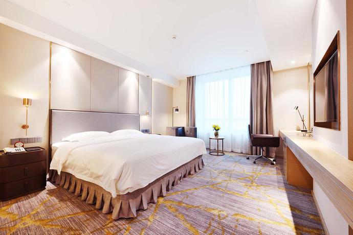Imagen de la habitación del Hotel Tianjin Golden Crown. Foto 5