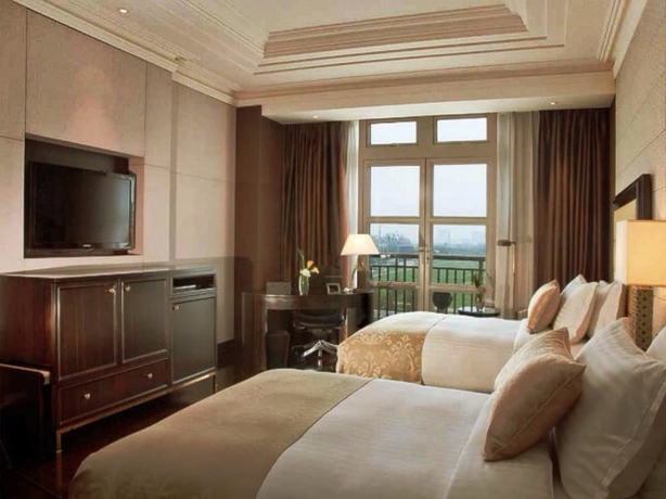 Imagen de la habitación del Hotel Tianjin Goldin Metropolitan Polo Club. Foto 10