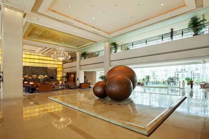 Imagen de los interiores del Hotel Tianjin Goldin Metropolitan Polo Club. Foto 14