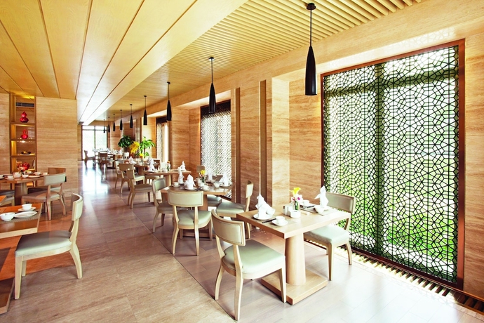 Imagen del bar/restaurante del Hotel Tianjin Goldin Metropolitan Polo Club. Foto 6