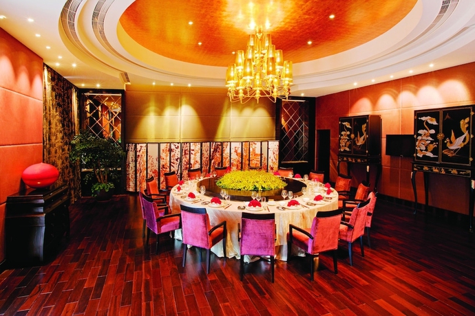 Imagen del bar/restaurante del Hotel Tianjin Goldin Metropolitan Polo Club. Foto 7