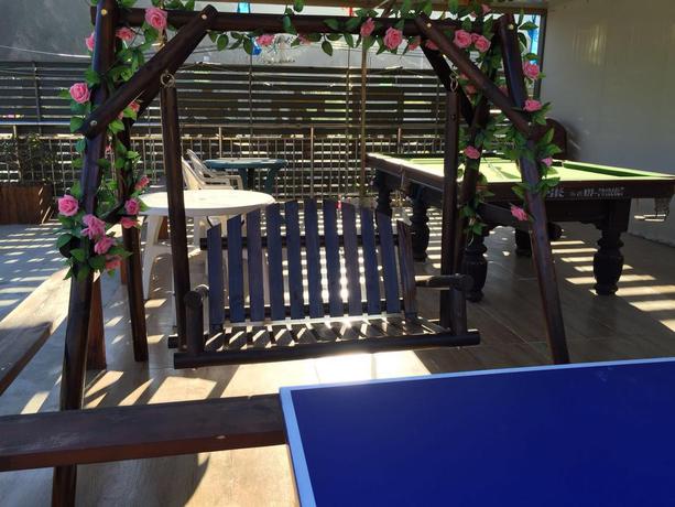 Imagen de los interiores del Hotel Tianjin Huangyaguan Great Wall Home. Foto 7