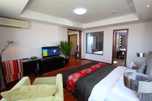 Imagen de la habitación del Hotel Tianjin In-zone. Foto 4
