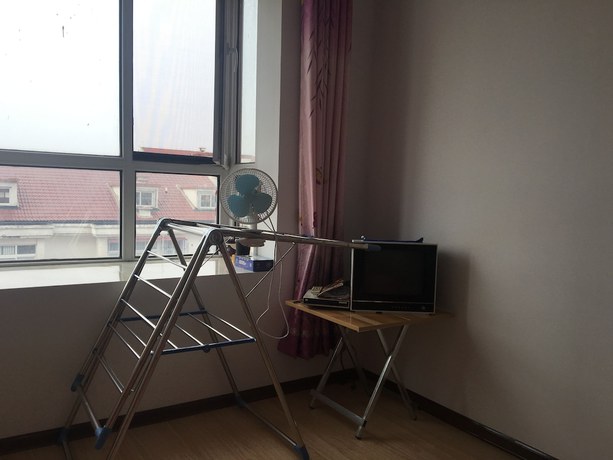 Imagen de la habitación del Hotel Tianjin Jianshe Jiayuan. Foto 5