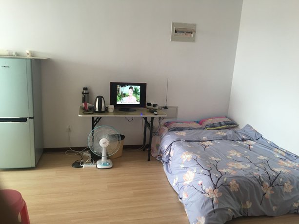 Imagen de la habitación del Hotel Tianjin Jianshe Jiayuan. Foto 8