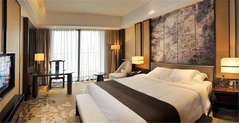 Imagen de la habitación del Hotel Tianjin Jinlong International. Foto 2