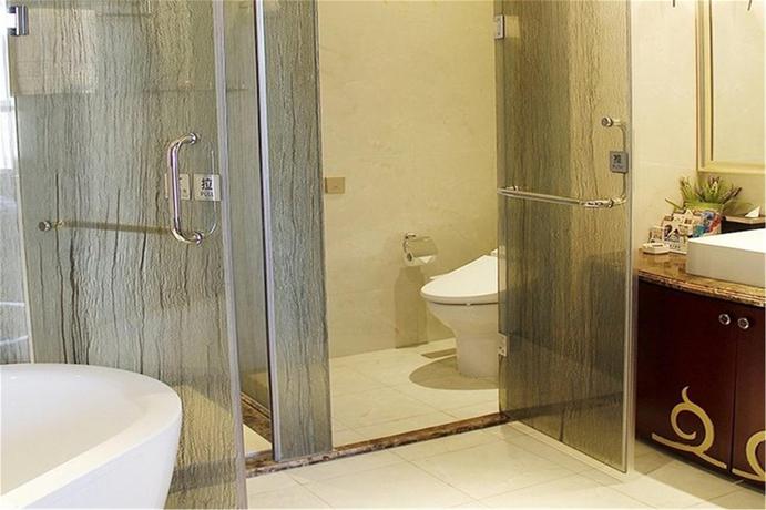 Imagen de la habitación del Hotel Tianjin Jinlong International. Foto 3