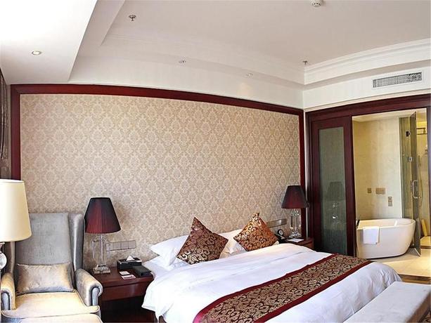 Imagen de la habitación del Hotel Tianjin Jinlong International. Foto 4