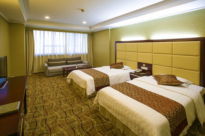 Imagen de la habitación del Hotel Tianjin Ocean. Foto 12