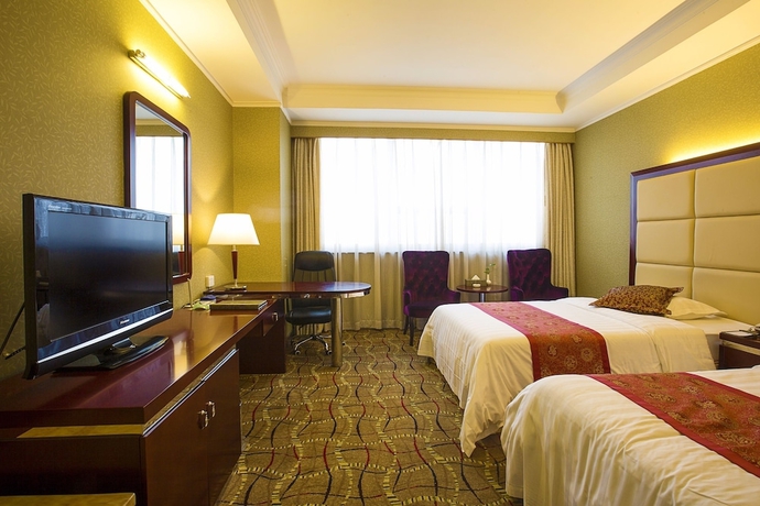 Imagen de la habitación del Hotel Tianjin Ocean. Foto 13