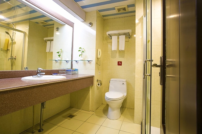 Imagen de la habitación del Hotel Tianjin Ocean. Foto 15