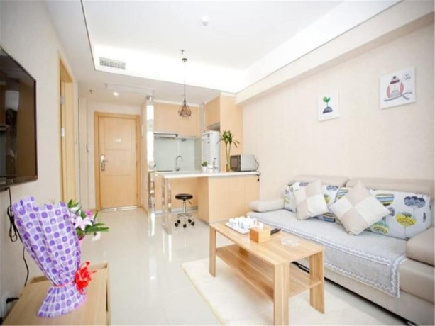 Imagen de la habitación del Hotel Tianjin Qingcheng Boutique Apartment. Foto 2