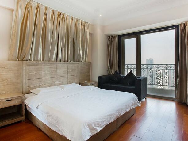 Imagen de la habitación del Hotel Tianjin Saina Mansion Service Apartment. Foto 11