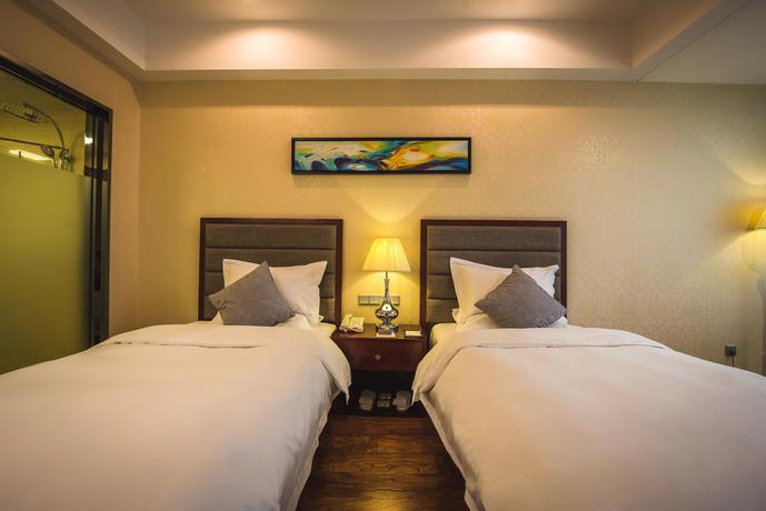 Imagen de la habitación del Hotel Tianjin Xinyusheng. Foto 3