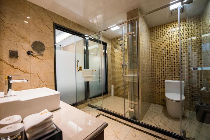 Imagen de la habitación del Hotel Tianjin Xinyusheng. Foto 4