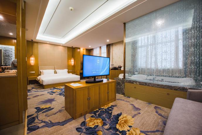 Imagen de la habitación del Hotel Tianjin Xinyusheng. Foto 6