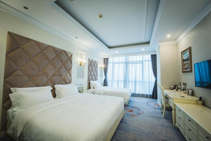 Imagen de la habitación del Hotel Tianjin Xinyusheng. Foto 7