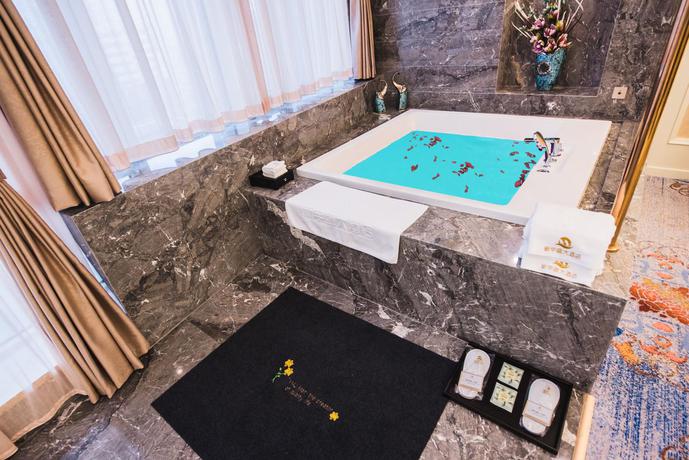 Imagen de la habitación del Hotel Tianjin Xinyusheng. Foto 8