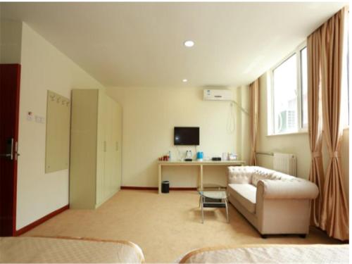 Imagen de la habitación del Hotel Tianjin Yong Hui. Foto 7