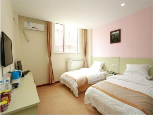 Imagen de la habitación del Hotel Tianjin Yong Hui. Foto 8
