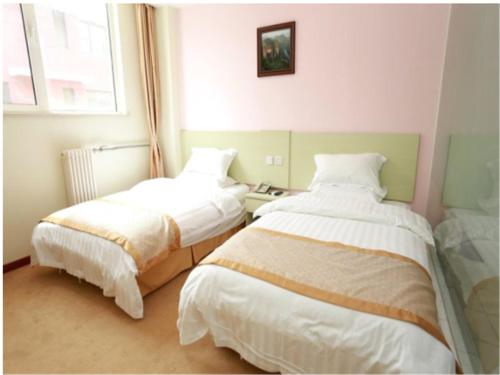 Imagen de la habitación del Hotel Tianjin Yong Hui. Foto 9