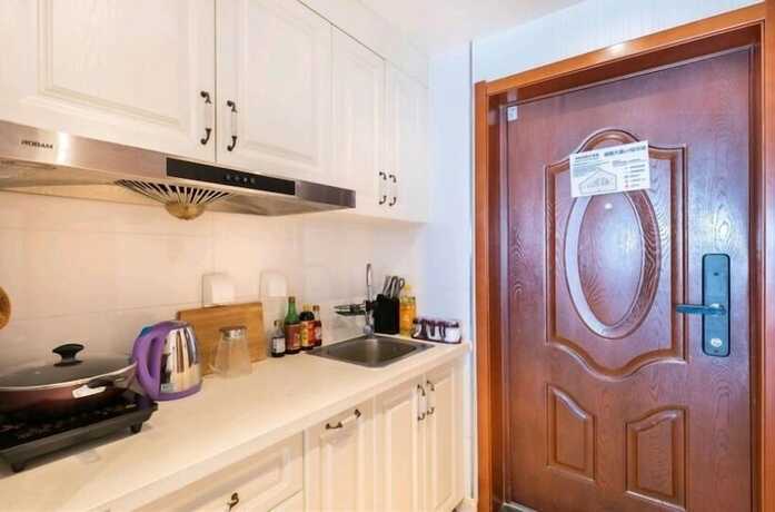 Imagen de la habitación del Hotel Tianjin Yujingxuan Boutique Apartments. Foto 31
