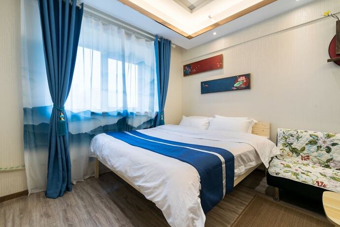 Imagen de la habitación del Hotel Tianjin Yujingxuan Boutique Apartments. Foto 36