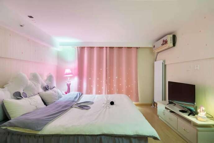Imagen de la habitación del Hotel Tianjin Yujingxuan Boutique Apartments. Foto 39