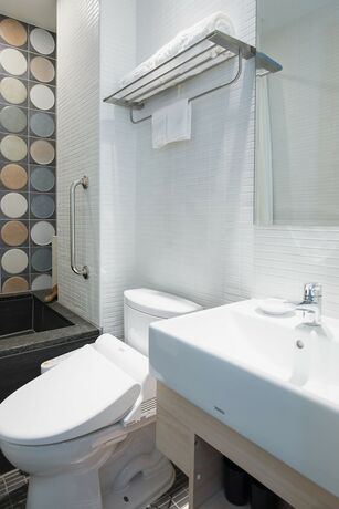 Imagen de la habitación del Hotel Tianli. Foto 16
