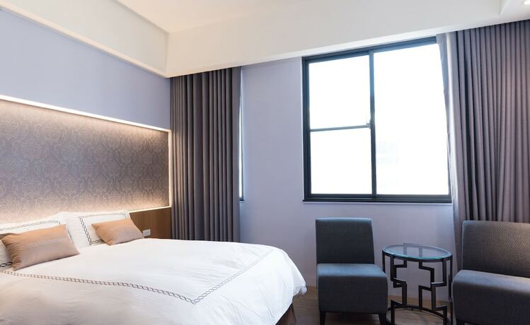 Imagen de la habitación del Hotel Tianli. Foto 17