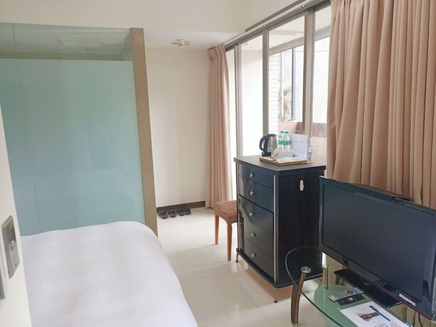 Imagen de la habitación del Hotel Tianmu Star hotel. Foto 17