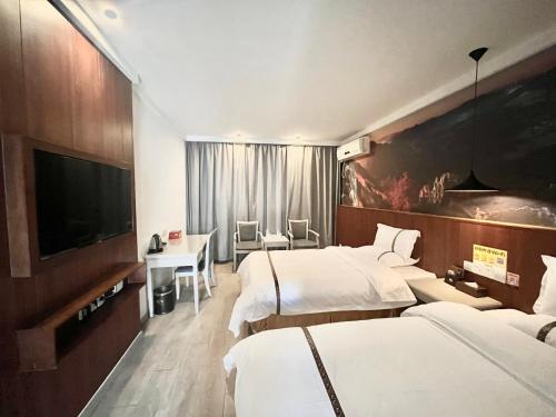 Imagen de la habitación del Hotel Tianshui Times Zhangjiagang. Foto 11
