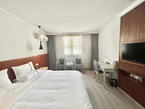Imagen de la habitación del Hotel Tianshui Times Zhangjiagang. Foto 12