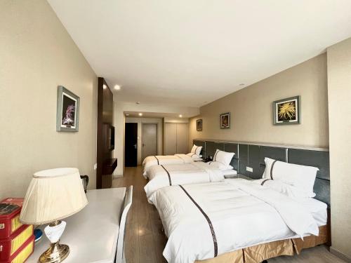 Imagen de la habitación del Hotel Tianshui Times Zhangjiagang. Foto 14