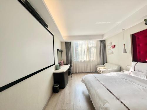 Imagen de la habitación del Hotel Tianshui Times Zhangjiagang. Foto 15