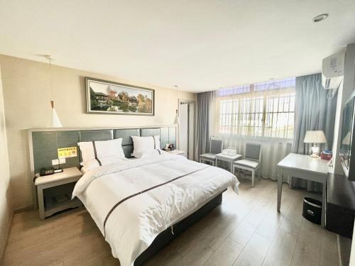 Imagen de la habitación del Hotel Tianshui Times Zhangjiagang. Foto 16