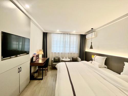 Imagen de la habitación del Hotel Tianshui Times Zhangjiagang. Foto 18