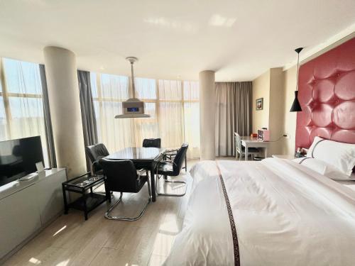 Imagen de la habitación del Hotel Tianshui Times Zhangjiagang. Foto 19