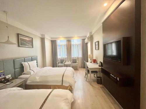 Imagen de la habitación del Hotel Tianshui Times Zhangjiagang. Foto 20