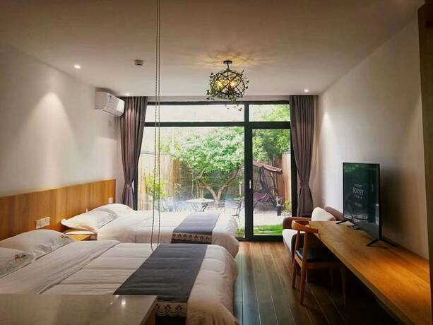 Imagen de la habitación del Hotel Tiansu Mountain Residence. Foto 10