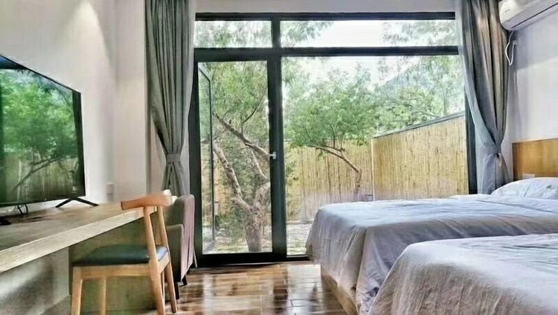 Imagen de la habitación del Hotel Tiansu Mountain Residence. Foto 12