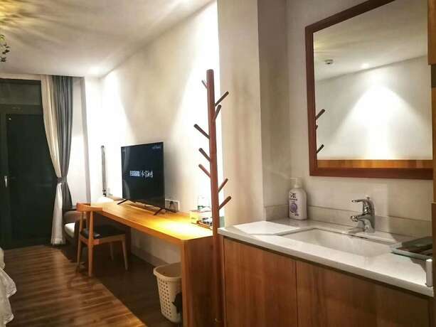 Imagen de la habitación del Hotel Tiansu Mountain Residence. Foto 16