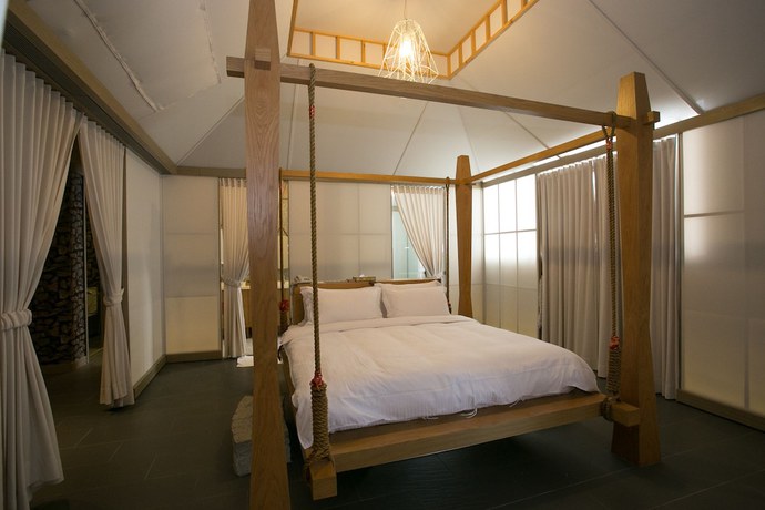Imagen de la habitación del Hotel Tianxiaju Motel. Foto 10